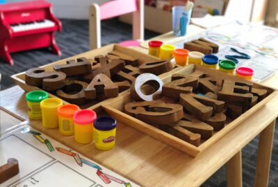 brown letters toys on table