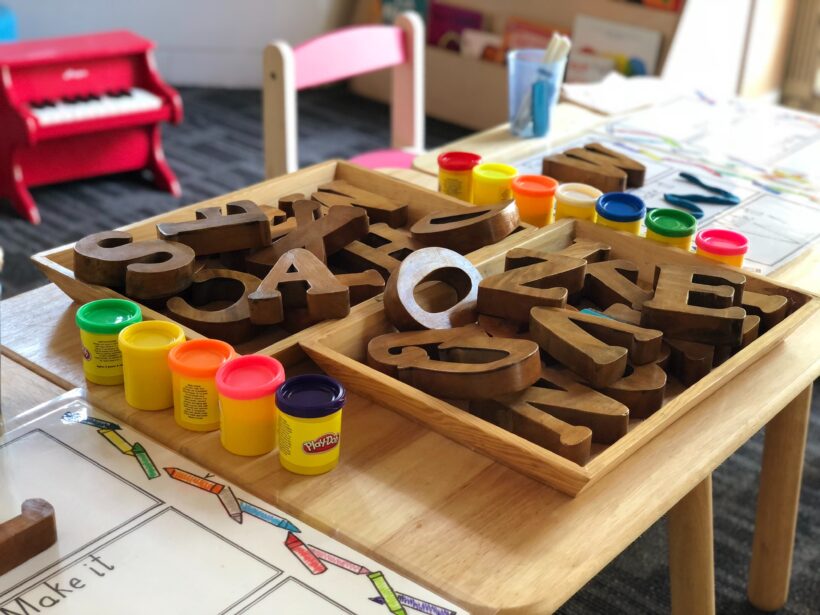 brown letters toys on table